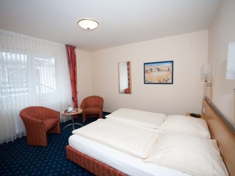 Akzent-hotel-hubertus-melle-zimmerkategorie-komfort-bett-big-370287